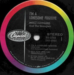 I’m a Lonesome Fugitive by Merle Haggard